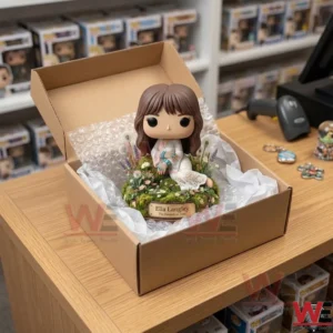 A vinyl figure of a woman on a floral base sitting inside an open cardboard box with bubble wrap! The box is on a wooden retail counter! The background features multiple shelves of boxed toys and collectibles! A handheld scanner is on the table next to the box!
