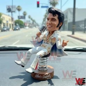 Bobble figure of a retro singer in a white stage outfit holding a microphone on a spring base!