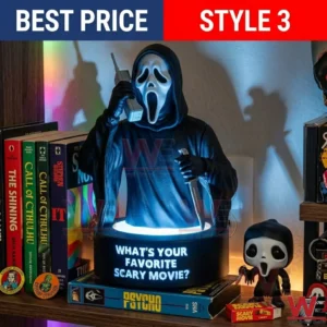 A Ghostface bust holding a phone and a knife on a glowing base with a movie quote! Books like IT and The Shining are on the left side! A small toy figure is on the right!