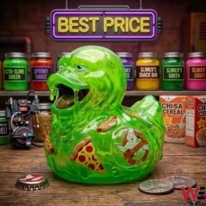 A close up of a Slimer themed rubber duck toy with food graphics on a wooden table with Ghostbusters props!