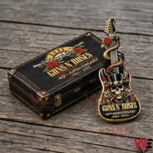 Guns N Roses anniversary guitar pin beside a display case!