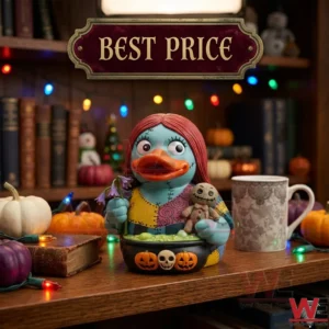 Blue ragdoll rubber duck with red hair wearing a patchwork dress on a wooden shelf with Halloween decorations!