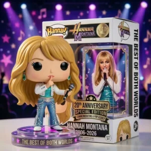Blonde singer collectible with microphone beside anniversary box on a lit stage background!