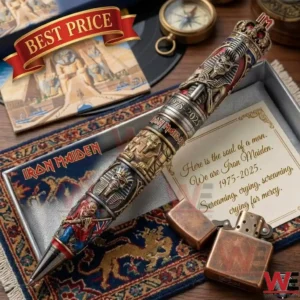 Commemorative heavy metal band pen with intricate skeletal engravings and a crown cap displayed with vintage accessories!