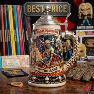 Intricate Iron Maiden anniversary stein with spine handle and skull lid surrounded by band merchandise.