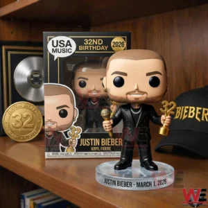 Birthday collectible figure with display box on a shelf with music themed items!