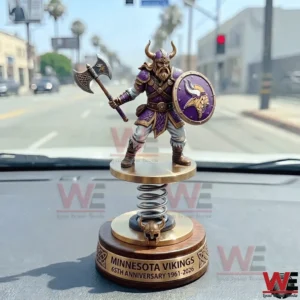 Minnesota Vikings anniversary bobblehead on a car dashboard!