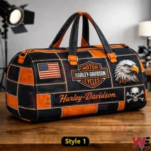Black and orange biker style duffle bag with eagle flag and skull details!