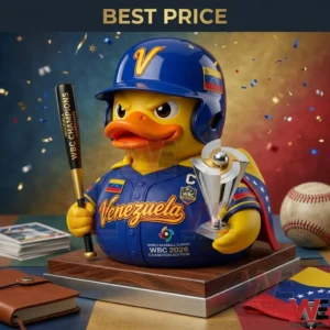 A celebratory Venezuela baseball rubber duck holding a trophy and a championship bat. The duck is dressed in a blue team uniform and helmet while sitting on a wooden display base surrounded by confetti.