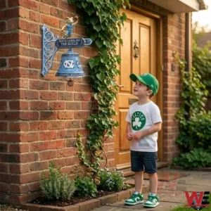 Child looking at a North Carolina Tar Heels wall bell by a front door!
