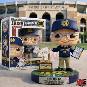 Lou Holtz Notre Dame collectible figure with trophy and box in front of Notre Dame Stadium!