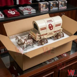 An open shipping box containing a Sooner Schooner model secured in white foam packaging!