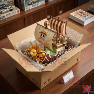 One Piece Thousand Sunny Straw Hat Wind Spinner 3 An unboxing view of the Thousand Sunny pirate ship model inside a shipping container!