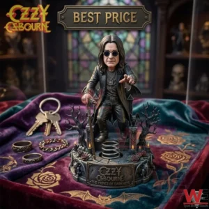 Ozzy Osbourne collectible figurine sitting on a gothic throne with jewelry and keys on a purple velvet cloth!