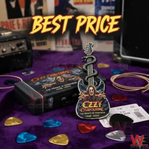 Ozzy Osbourne enamel pin and box displayed on purple fabric with guitar picks!