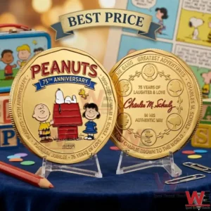 Gold Peanuts 75th anniversary collectible coins on display stands.
