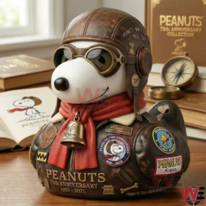 Peanuts anniversary aviator Snoopy collectible on a desk with books and a compass!