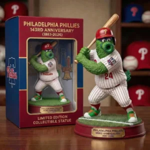 Philadelphia Phillies mascot anniversary statue beside collector box!