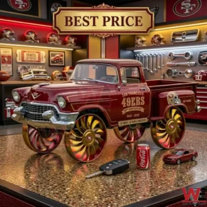 A red 49ers truck model on a high stand above a floral display! The setup includes a team soda can a ring and a football on a wooden base! The background shows a collection of team jerseys and helmets in glass cabinets!