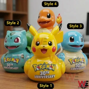 Four glossy pokemon duck figures on a table with different character styles!