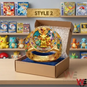 A wide gold Pokemon ring with many characters on its face sits in a blue velvet box ready for shipping!