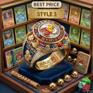 A gold anniversary ring with a red circular top and a sculpted Mew on the side sits in a collector display!