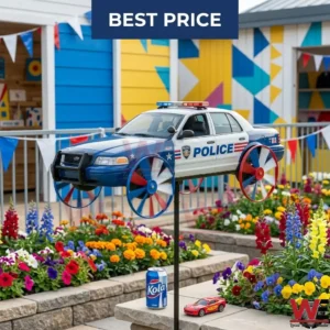 A blue and white police car model with propeller wheels being unpacked from a shipping box!