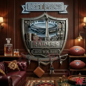 Raiders Just Win Baby Wall-Mounted Key Holder 4 A Raiders metal wall organizer with a glowing stadium and Las Vegas theme! The plaque has four hooks at the bottom holding a wallet and keys! The room includes a leather sofa footballs and casino games!