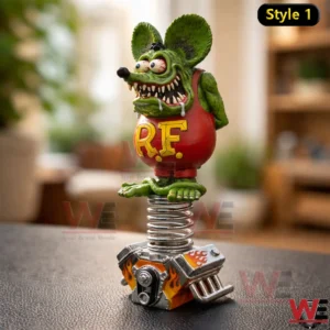 Green monster mouse figure on a spring with an engine base indoors!