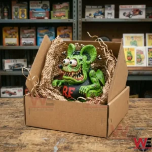 Rat Fink Shaped Rubber Duck 3 An open cardboard box containing a green Rat Fink figure secured with shredded paper packaging!