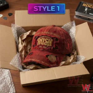 A red Rush baseball cap packed for shipping inside a cardboard box with protective materials!