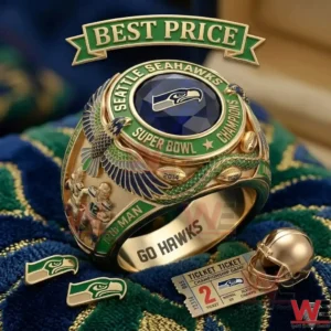 A highly detailed Seattle Seahawks championship ring with a blue stone and player engravings on a themed towel!