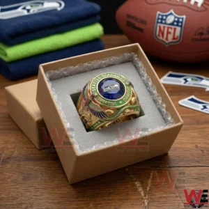 A Seahawks Super Bowl ring sitting in a foam insert inside a cardboard box ready for delivery!