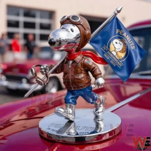 Snoopy 75th Anniversary Car Hood Ornament 3 Snoopy pilot hood ornament on a vintage red car.