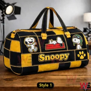 Black and yellow Snoopy patchwork duffel bag with character graphics on the front!