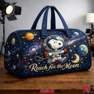 Dark blue Snoopy astronaut duffel bag with galaxy and planet artwork!