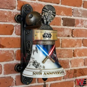 Wall mounted Star Wars themed anniversary decorative bell on a brick wall!