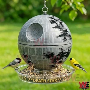 Death star themed bird feeder with two birds eating seeds in a green garden!
