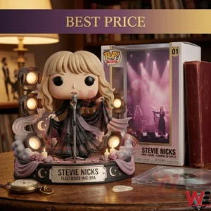 A vinyl figure of Stevie Nicks in a black dress on a stage base with lights and candles! The figure has blonde hair and a nameplate on the base! A collector box and a thick book are behind it! A watch and a CD are on the table! The scene has warm lighting and a scholarly background!