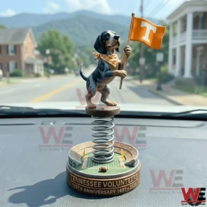 Tennessee Volunteers dog mascot bobblehead on a car dashboard!