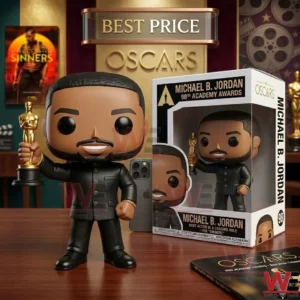 Michael B Jordan collectible figure holding a gold trophy standing next to its branded box on a wooden table!