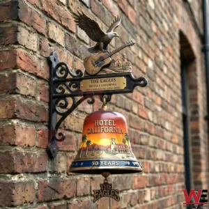 Wall mounted Hotel California anniversary bell with eagle and guitar on a brick wall!