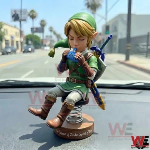Link figure playing an ocarina on a car dashboard!
