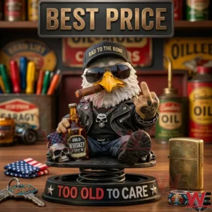 A biker eagle bobblehead with a whiskey bottle and cigar is displayed on a wooden table among vintage collectibles! The stand says too old to care!