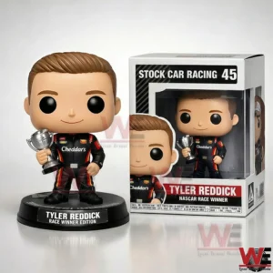 Tyler Reddick race winner collectible figure holding a trophy next to its display box!
