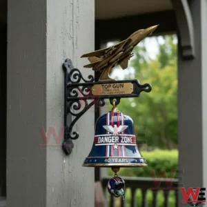 Top Gun 1986-2026 40th Anniversary Wall Bell 5 Top Gun themed bell with jet topper mounted on a gray porch post!
