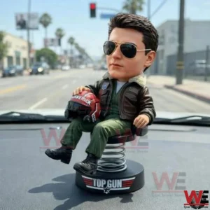 Top Gun Maverick dashboard bobblehead holding a helmet inside a car!