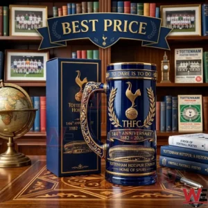 Tottenham Hotspur 144th anniversary commemorative beer stein and gift box on a wooden desk.