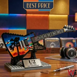 A U2 anniversary brick guitar model standing on a desk with studio gear!