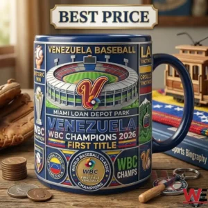 A photograph of a highly detailed commemorative baseball mug for Venezuela on a wooden surface with sports memorabilia.